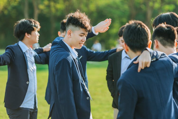 Group Of Young Men In Suits 