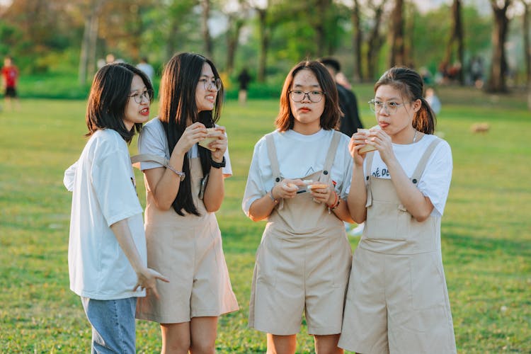 Teenage Girls In Park