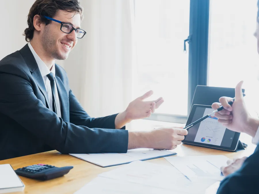 Account review meeting over a service report