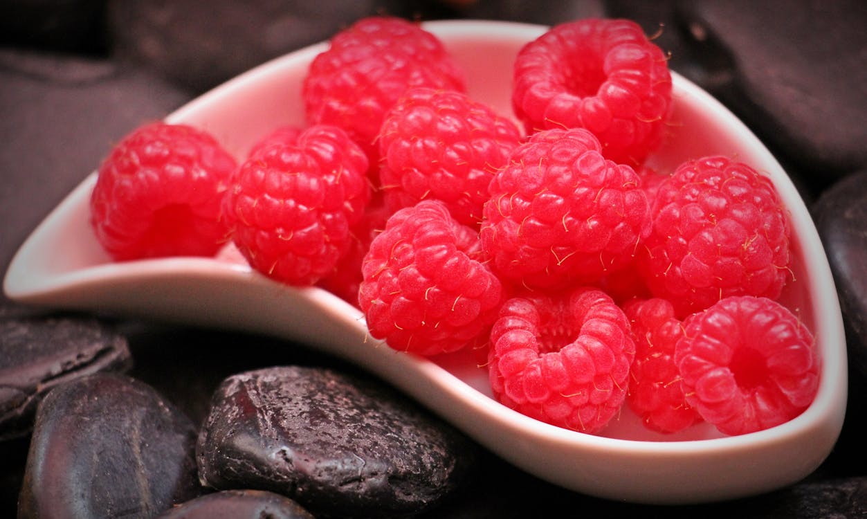 Red Raspberry Fruit on White Ceramic Tray