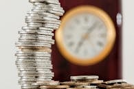 Selective Focus Photo of Stacked Coins