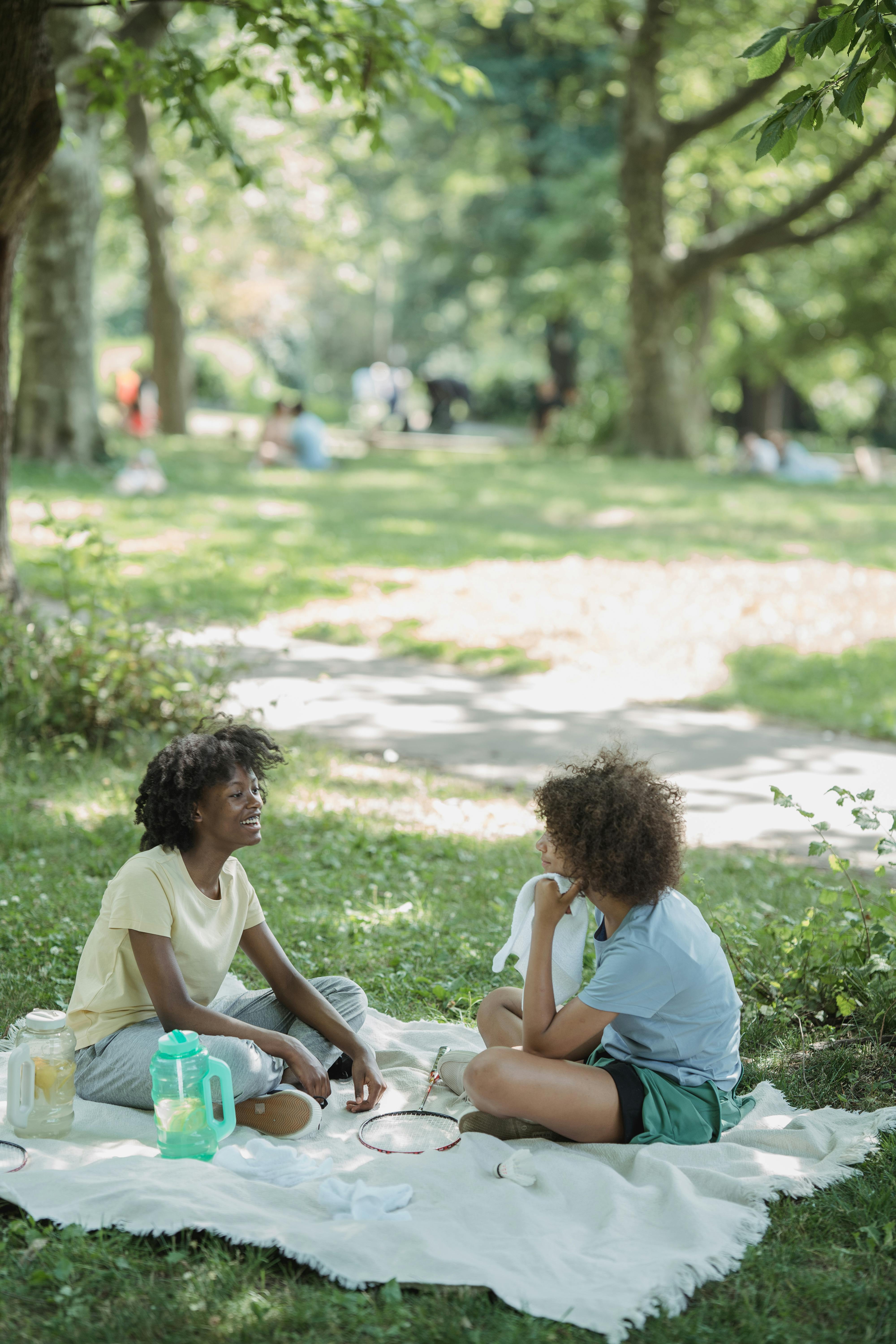 Two Teenage Girls Having Picnic In Park Free Stock Photo   Pexels Photo 12886756 