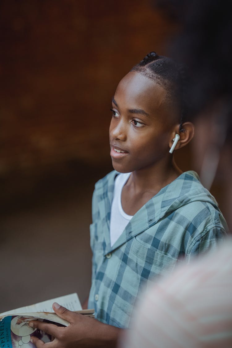 Boy In Shirt With Earphones