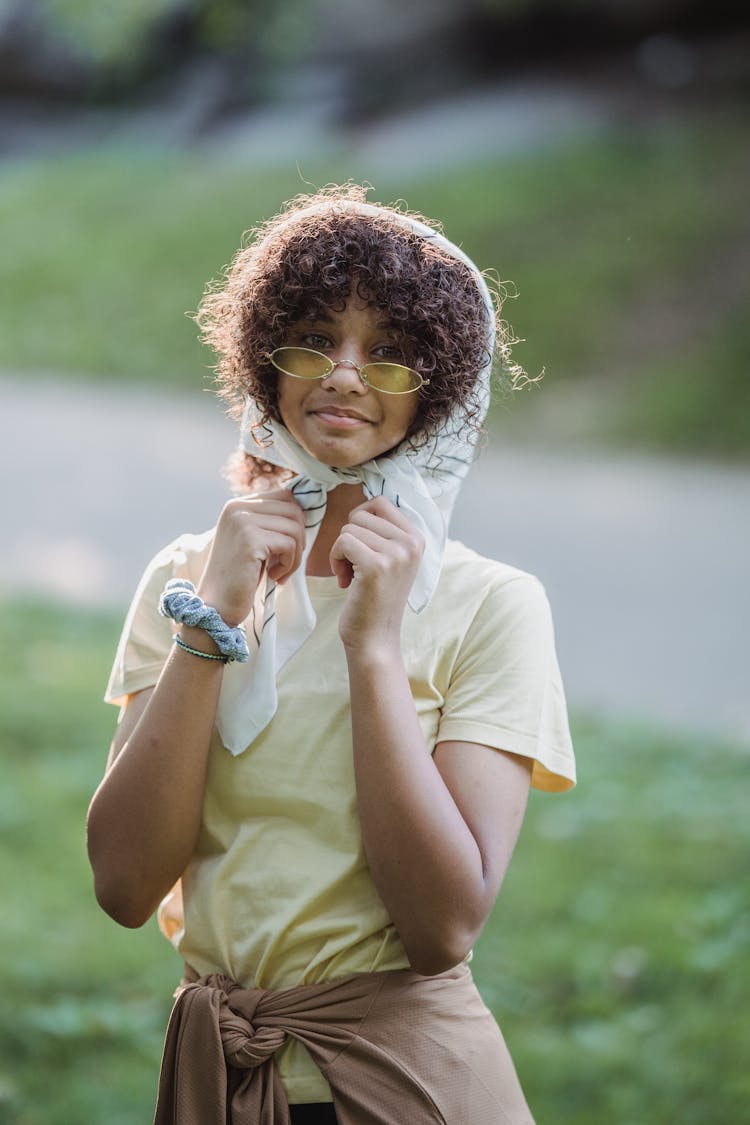 Portrait Of Girl In Handkerchief And Sunglasses