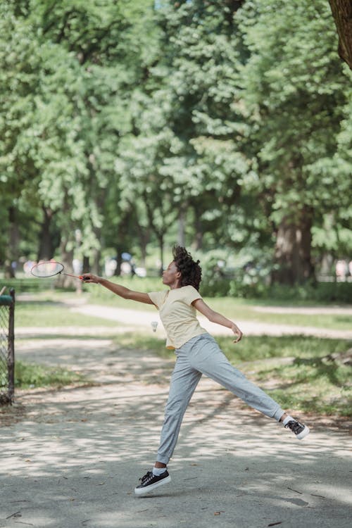 Free Teenage Girl Jumping in the Park  Stock Photo
