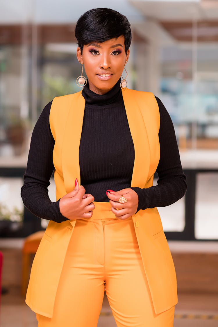 Stylish Woman Wearing A Yellow Vest 