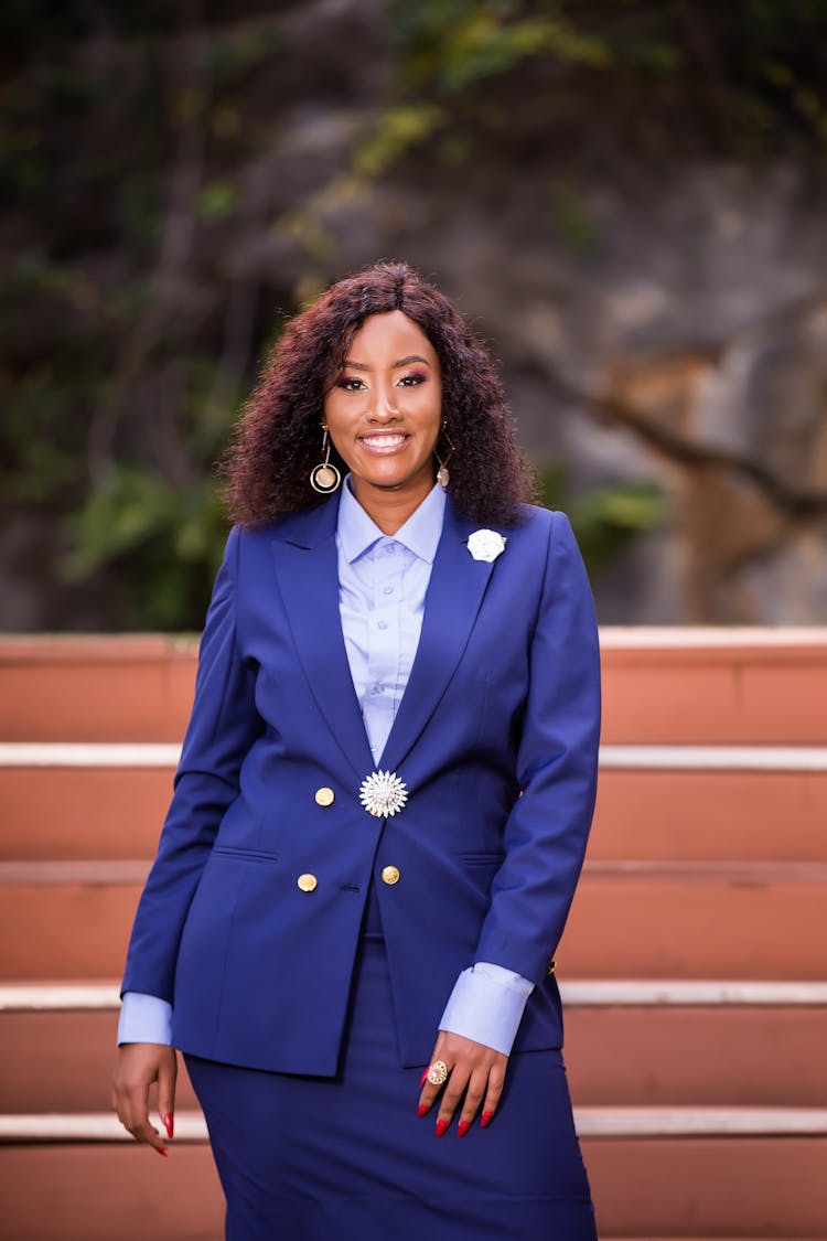 Portrait Of Smiling Woman In Suit