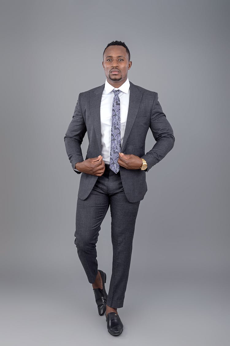 Good Looking Man Posing In Gray Suit 