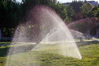 Hunter Irrigation System installation on a lush lawn