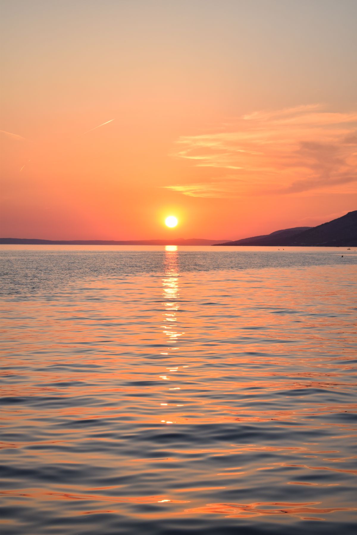 Zadar - apus peste Marea Adriatică cu valuri liniștite