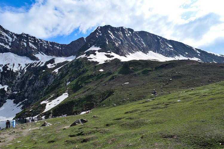 Landscape Scenery Of A Field Across The Mountain