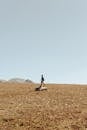 Hiker Walking Alone on the Desert