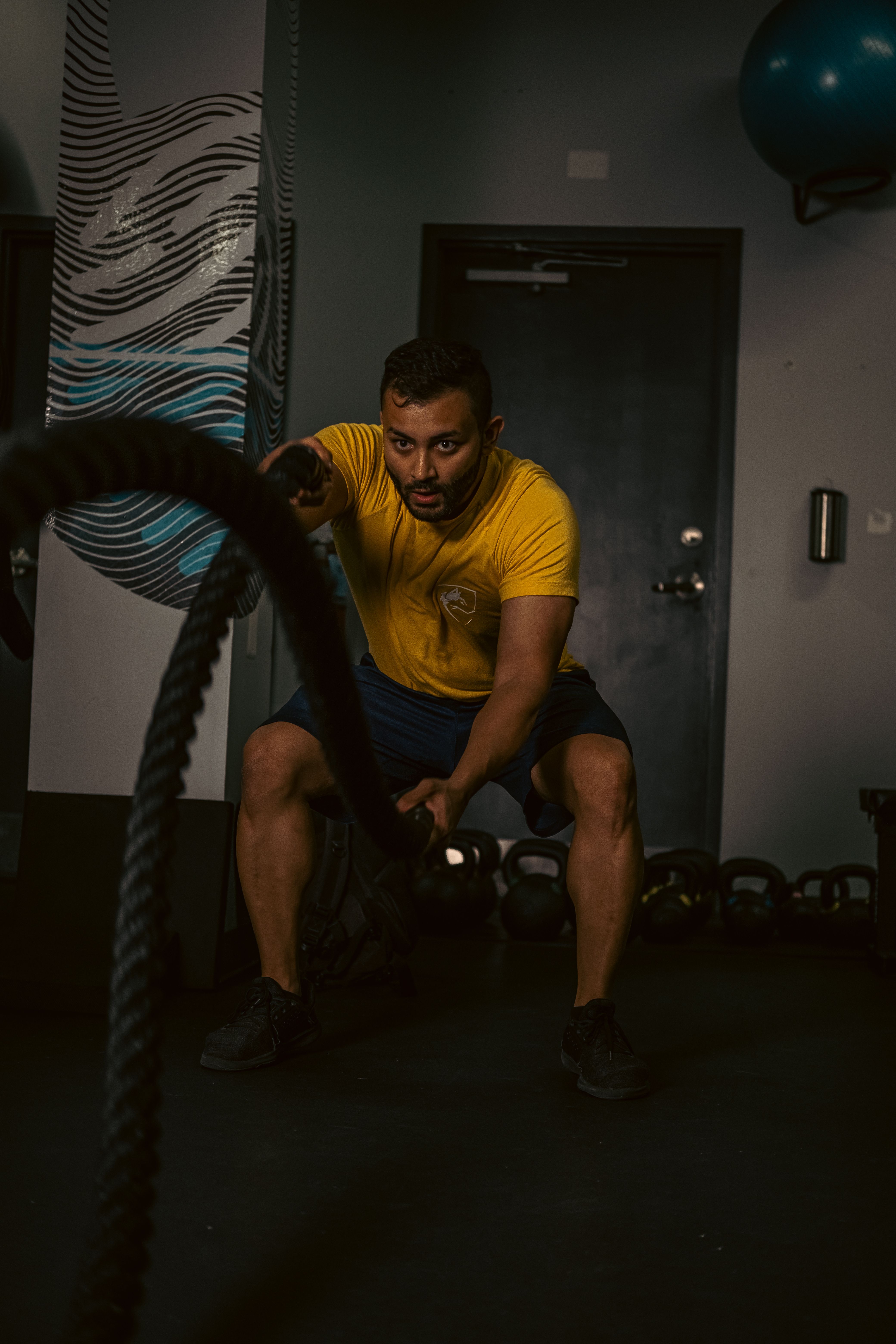 A Man using a Rope while Doing an Exercise · Free Stock Photo