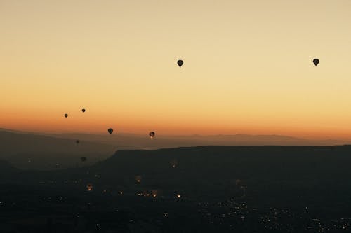 Ingyenes stockfotó este, hajnal, hőlégballonok témában Stockfotó
