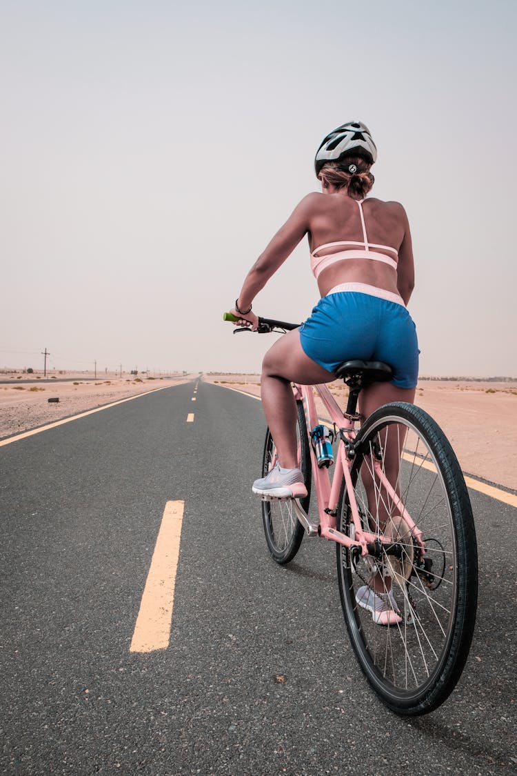 Woman Riding On Bicycle