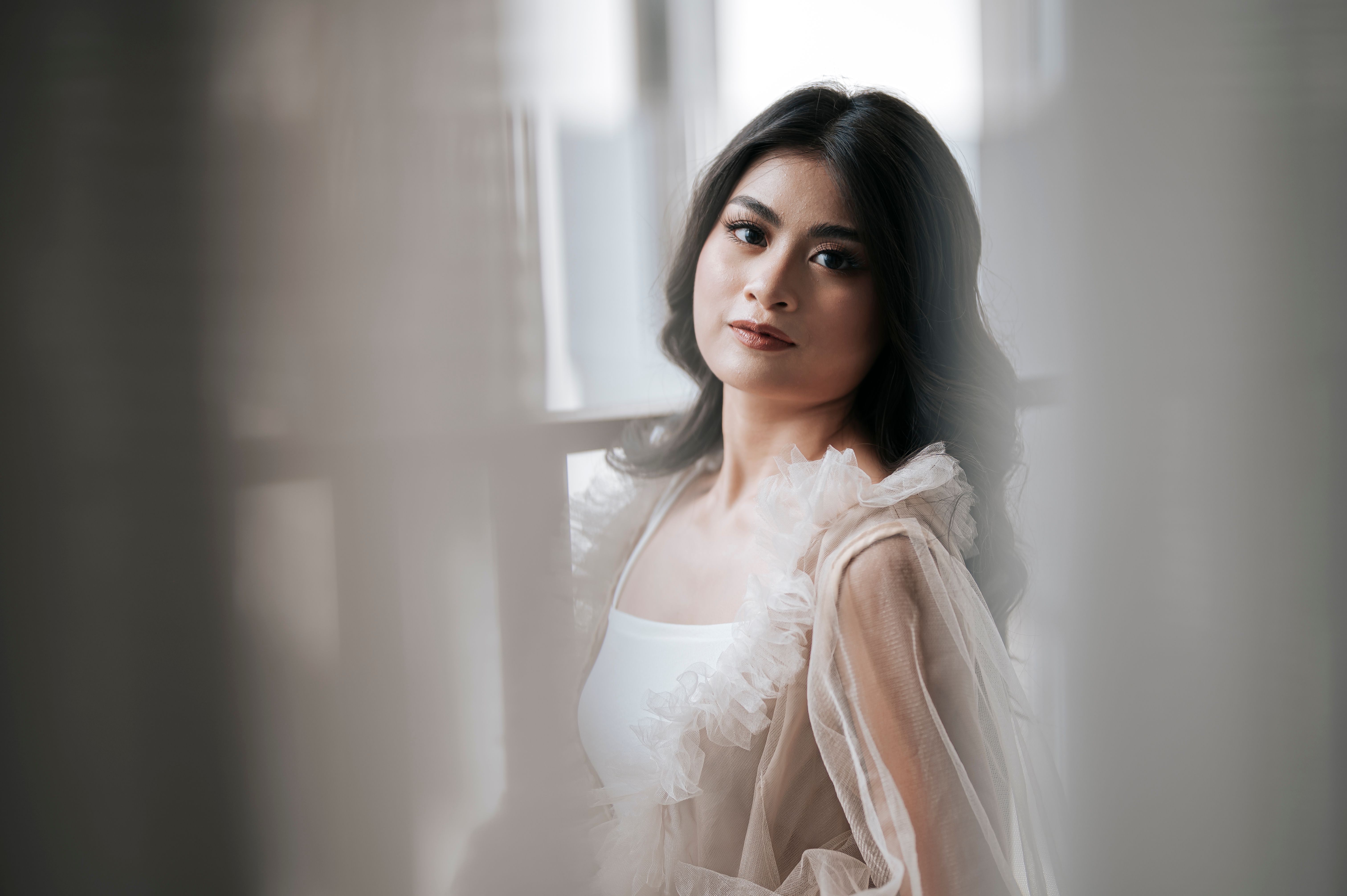 A Beautiful Woman in White Sheer Top · Free Stock Photo