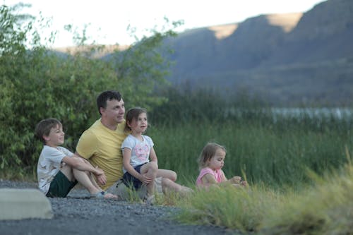 Free A Father Spending Time with His Children Stock Photo