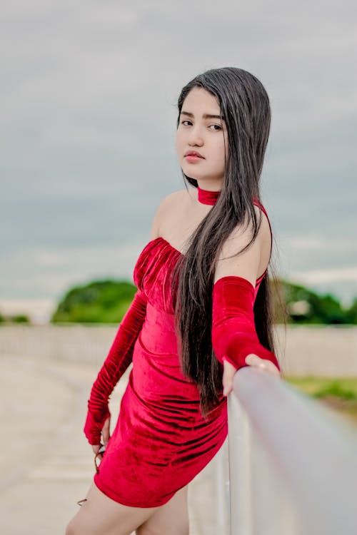 Woman in Red Long Sleeve Shirt