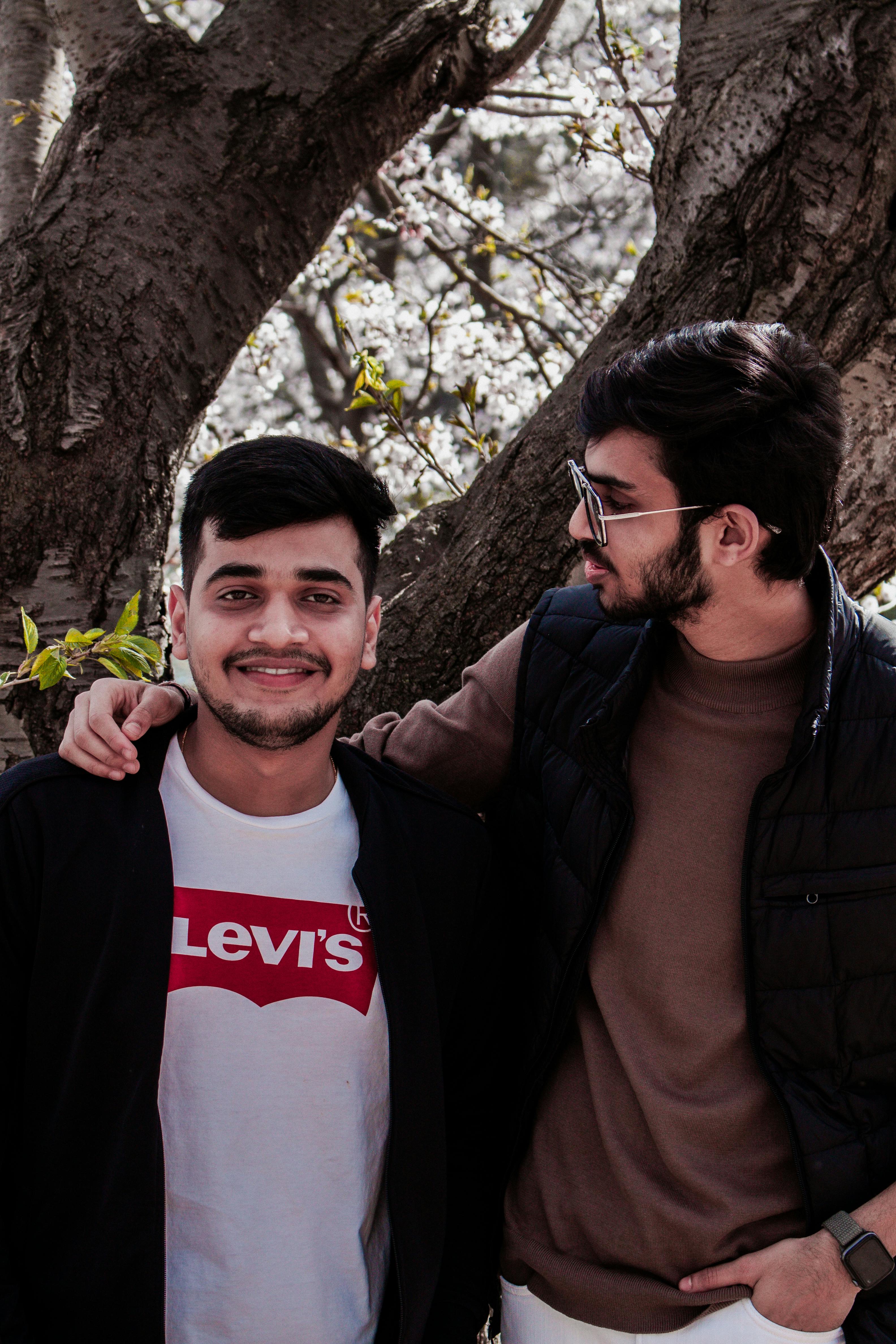 Two Men Standing Together · Free Stock Photo