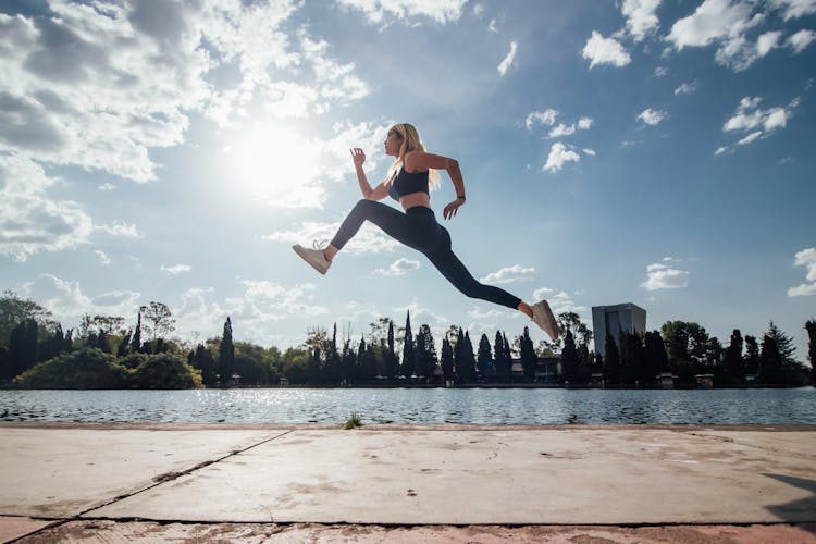 A Woman Running In The Park