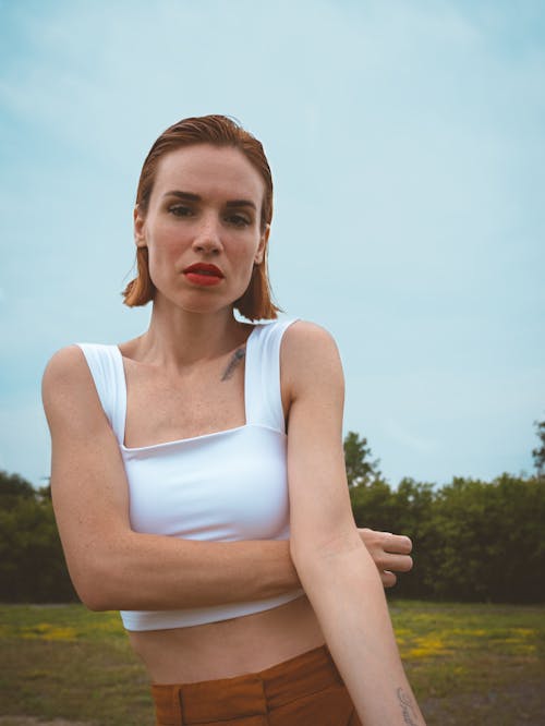 A Woman with Short Hair Wearing a Crop Top