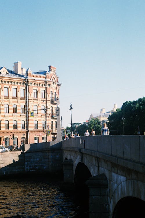 Old Bridge on River in City