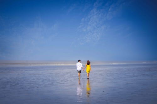 Couple Walking on the Beach