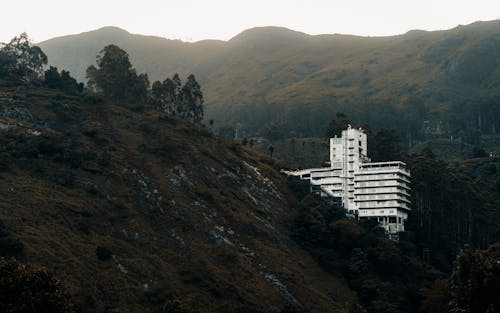 White Concrete Building on Top of the Mountain