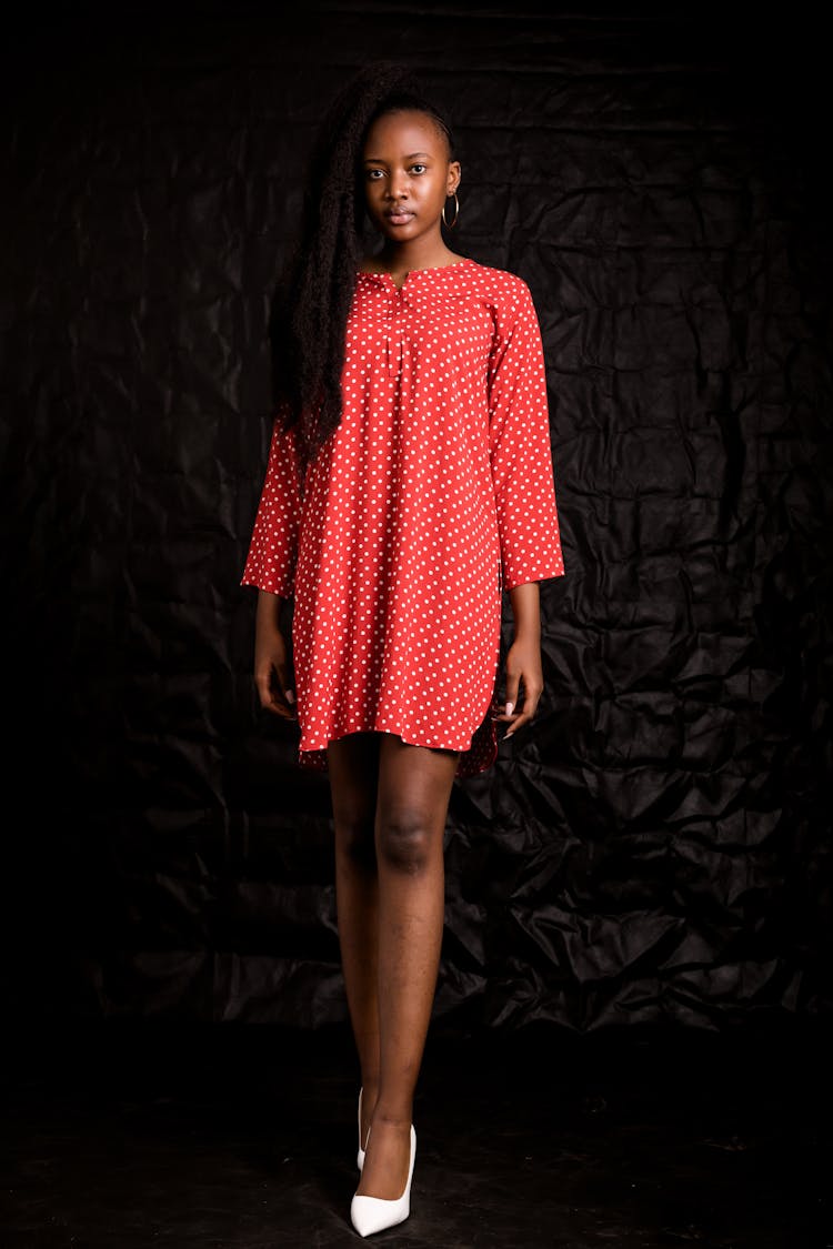 A Woman In Red Polka Dot Dress