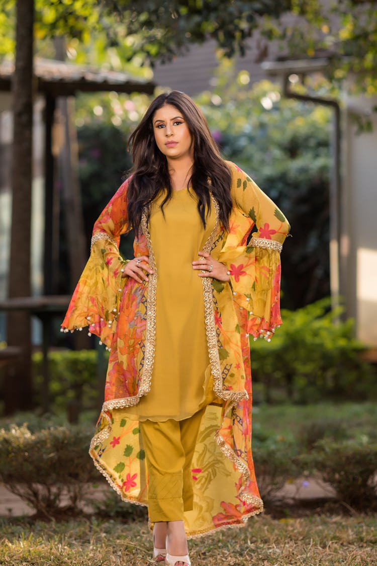 A Woman In Yellow Shalwar Kameez Dress