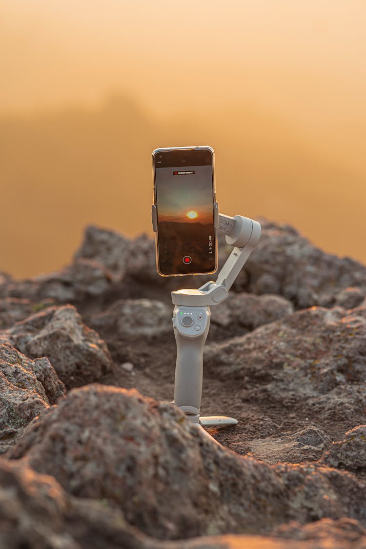 Smartphone On Tripod On Rock Filming Sunset