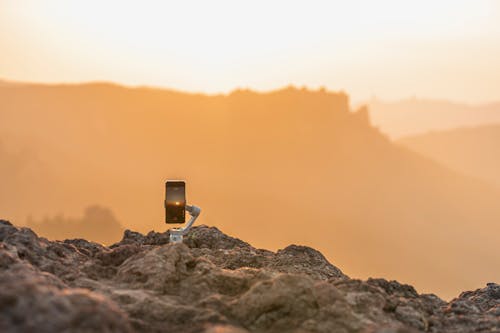 A Smartphone Recording a Video of the Golden Hour