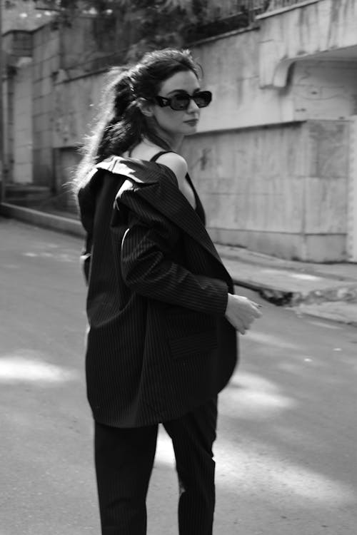 Woman in a Blazer and Sunglasses