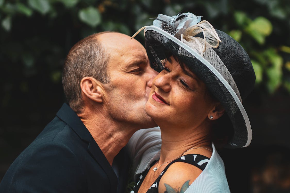 Free Man Kissing Woman Stock Photo