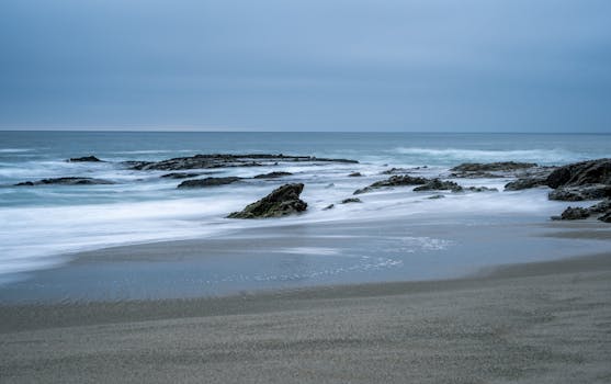 Peaceful view of waves and rocks at Laguna Beach, perfect for a calm escape.