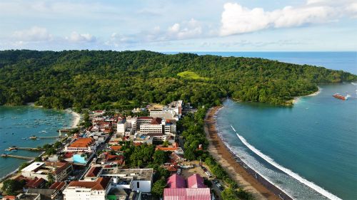 Free Stunning aerial photo of Pangandaran Beach in Jawa Barat, Indonesia, showcasing vibrant nature and coastal town. Stock Photo