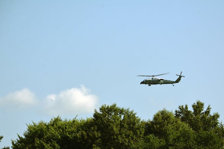 A Black Hawk Utility Vehicle In The Air