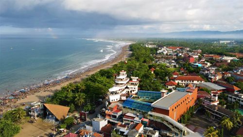 Free Stunning aerial view of Pangandaran Beach in Java, Indonesia, showcasing the coastline and vibrant cityscape. Stock Photo
