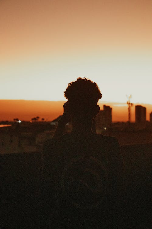 A Silhouette of a Man during the Golden Hour