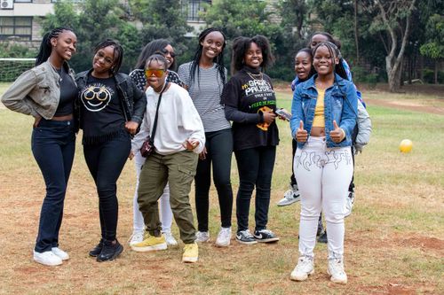 Free Diverse group of friends enjoying time together in a park, smiling and posing. Stock Photo