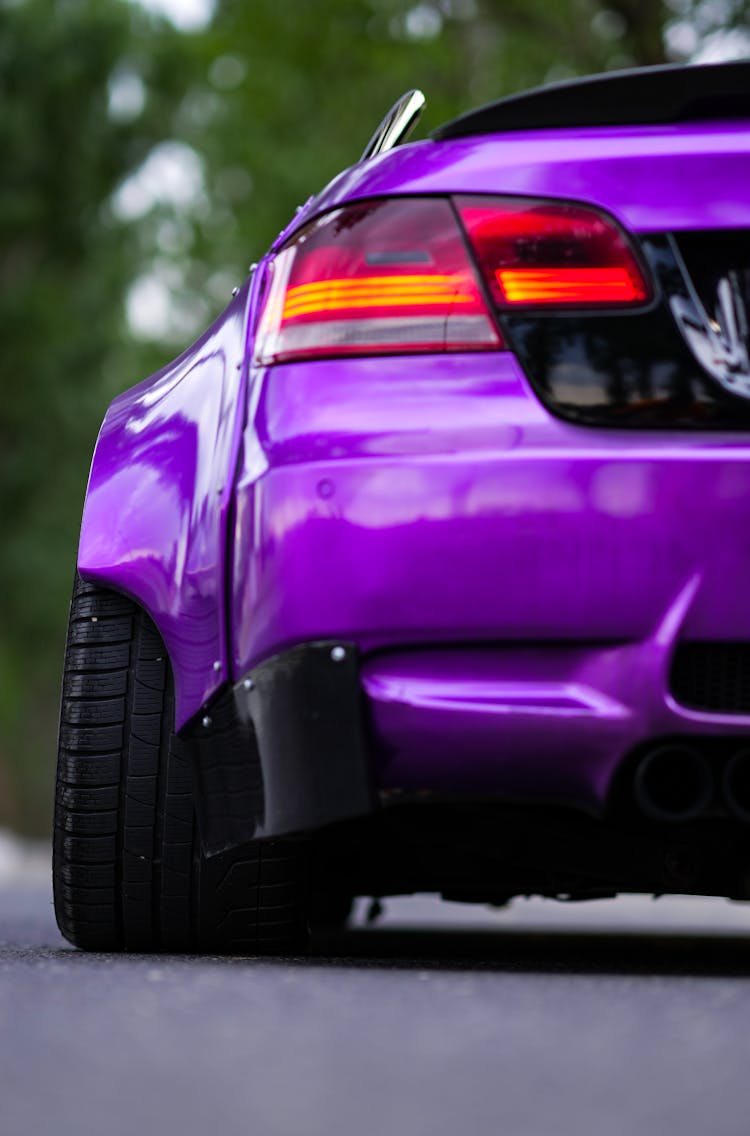 Close-up Of Modern Purple Sport Car Back