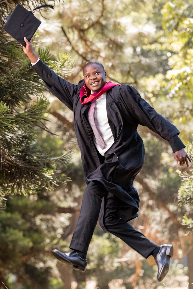 A Newly Graduate Man Doing A Wacky Pose