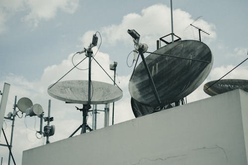 Close-up of Satellites on Building Roof