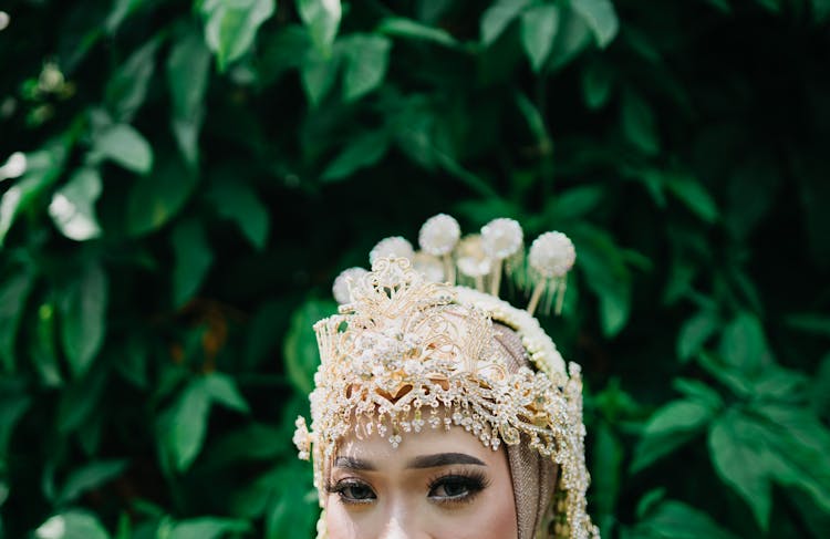 Woman In Crown With Golden Jewelry