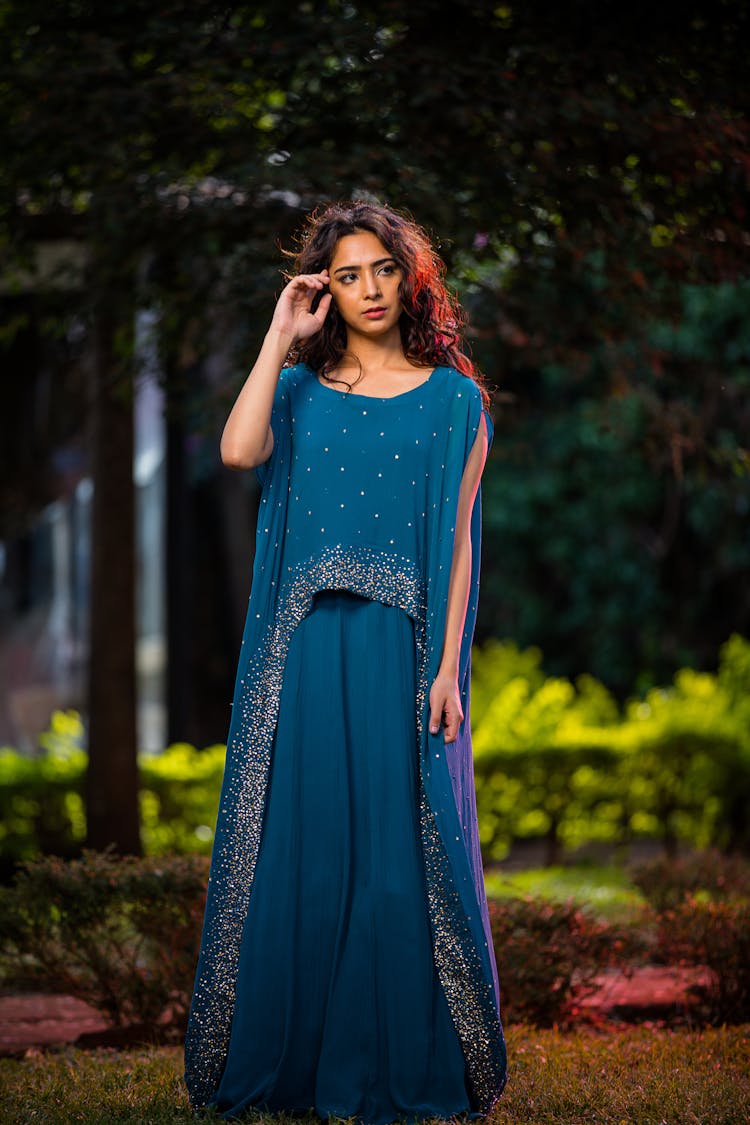 Woman Wearing A Blue Dress 