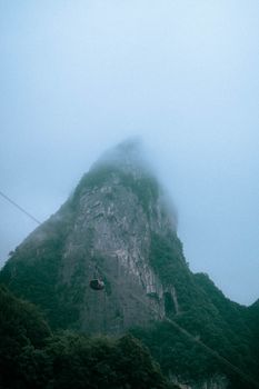 Green Mountain Under White Sky