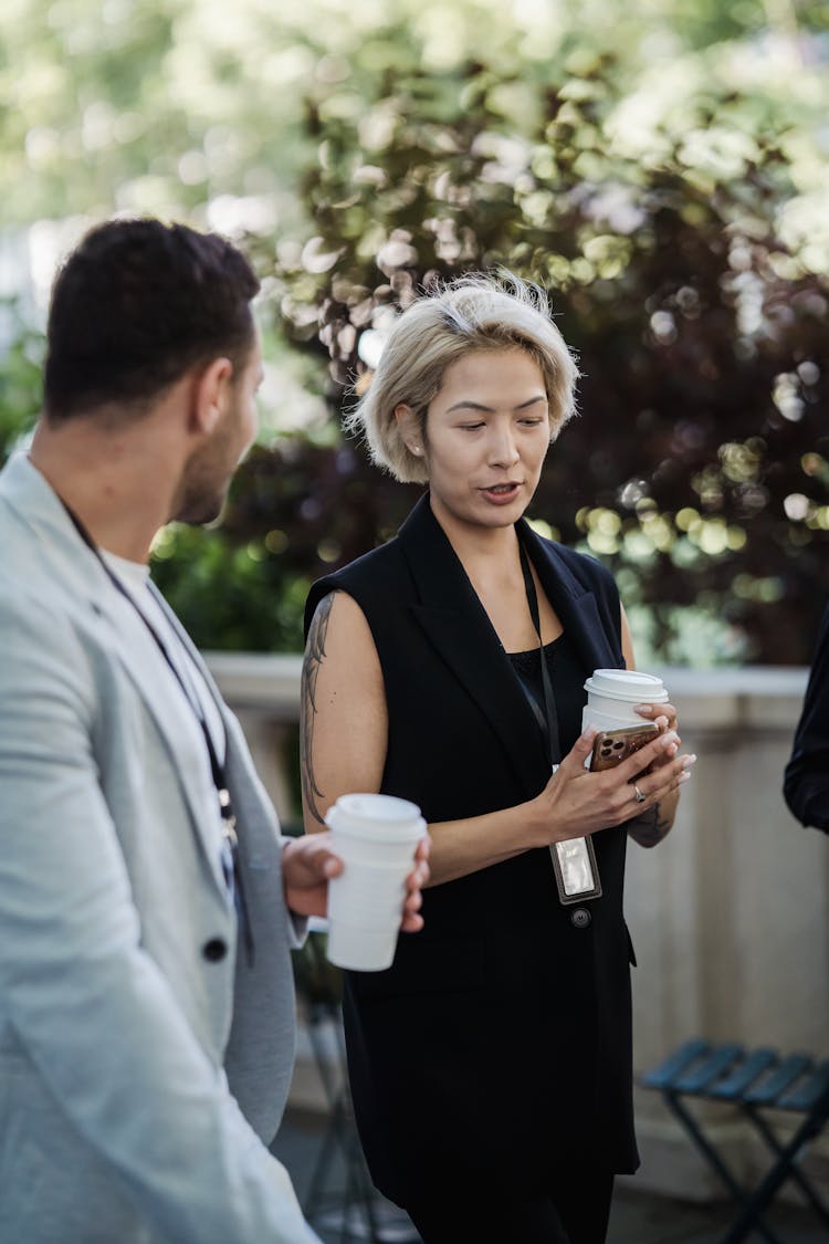 Couple Talking While Drinking Coffee