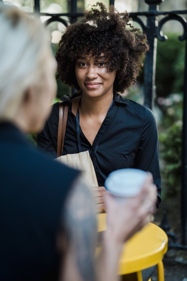 Couple Talking Over Coffee