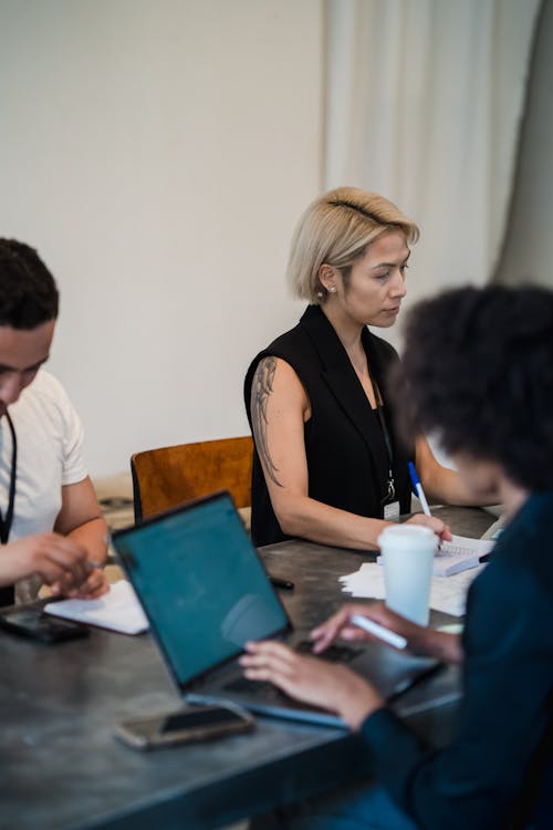 People Working in Open Space Office