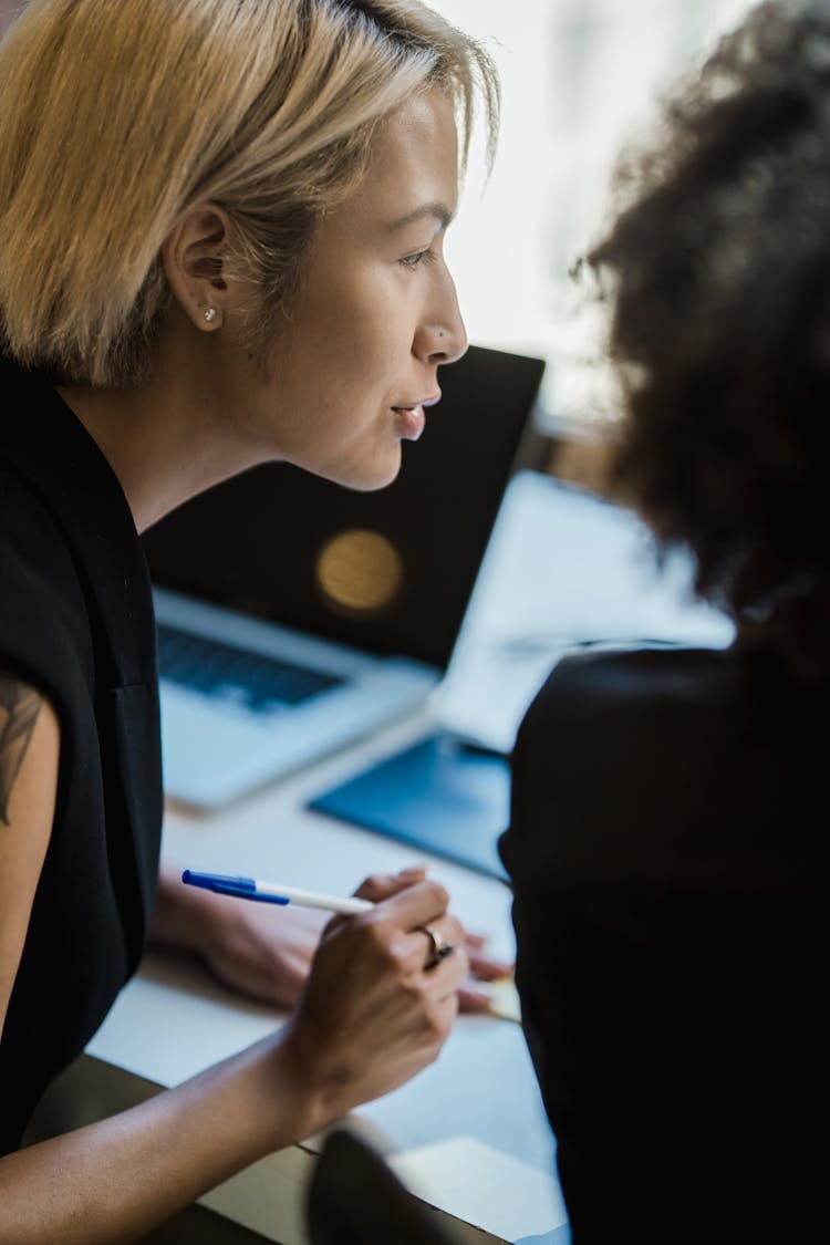 Woman Helping In Office